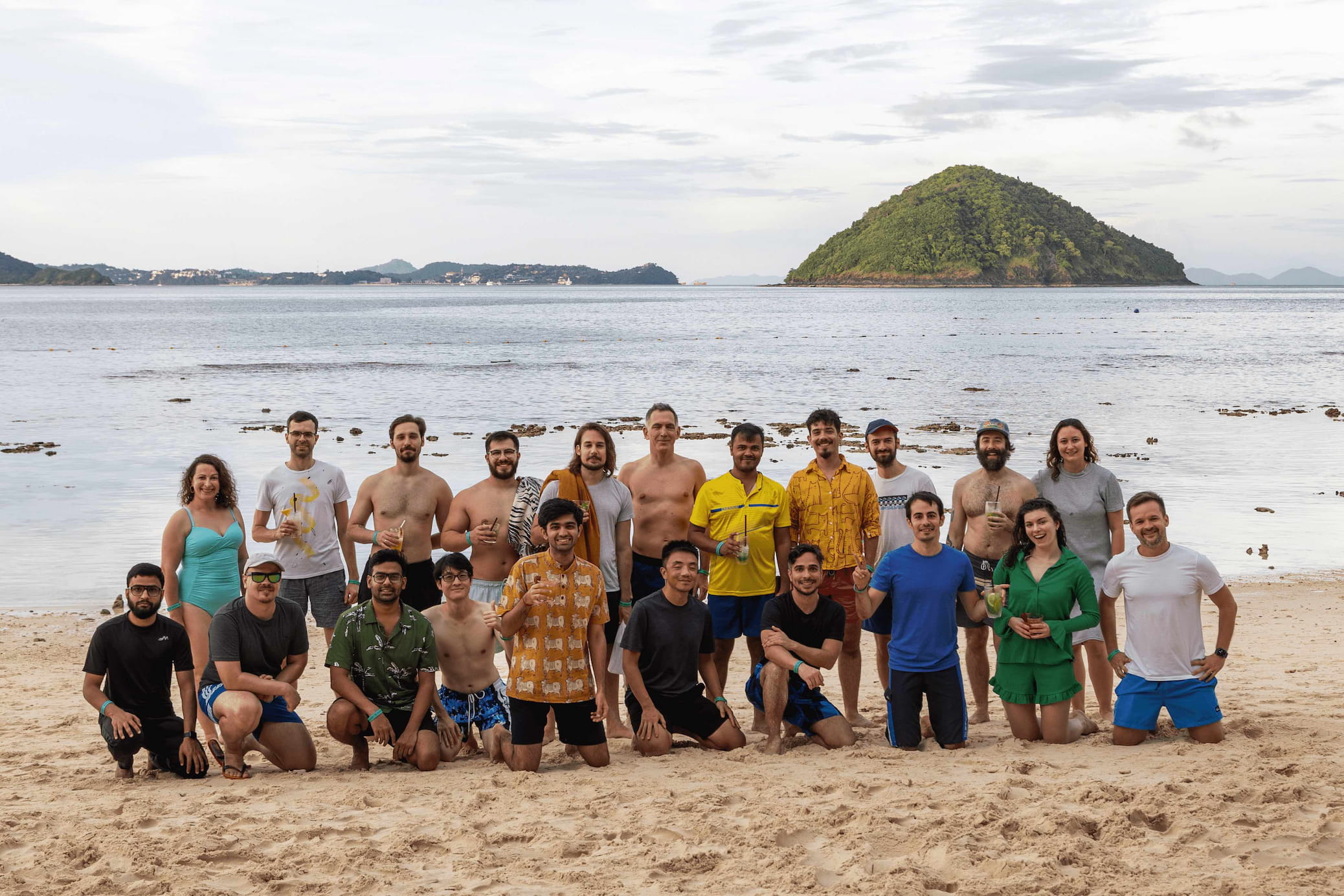 MUIers lined up at Banana Beach, enjoying the sand, scenery, and soft drinks.